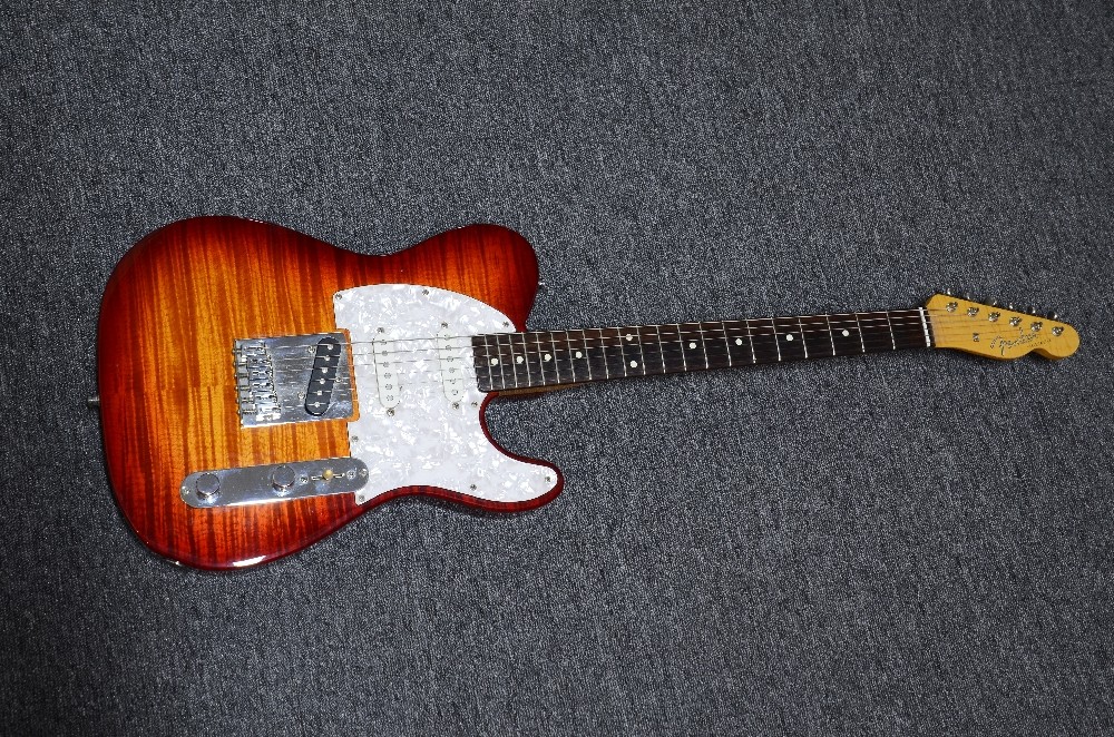 28 Fender Telecaster Japan Foto Flame 02.jpg