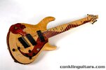 custom_8_string_guitar_quilted_maple_bubinga_curly_maple_2_large.jpg