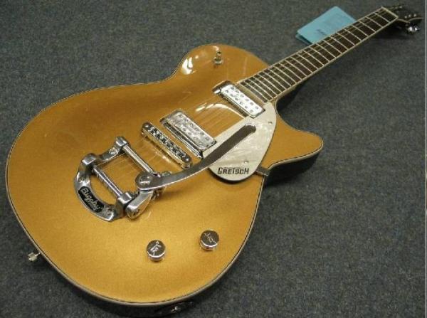 Gretsch 5236 oder 38. Mit Bigsby und mittlerweile Gretsch Filtertrons.