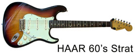 Seit 2010 spiele ich diese wunderschöne 60's Strat, handgefertigt von  Eric van der Haar. Besonderheiten sind die  Abigail Ybarra Fender Custom Shop Pickups an Hals und Mitte, Peter Florence Voodoo Pickup an der Brücke sowie die Funktion des unteren Klangreglers, der Hals- und Bridgepickup wie bei einer Tele  zusammen klingen lässt. Mehr Strat geht nicht:)